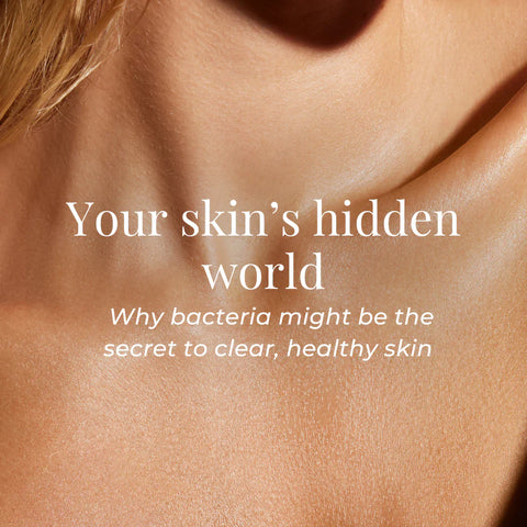 A zoomed-in, softly lit image of a person’s neck and upper chest with radiant, smooth skin.